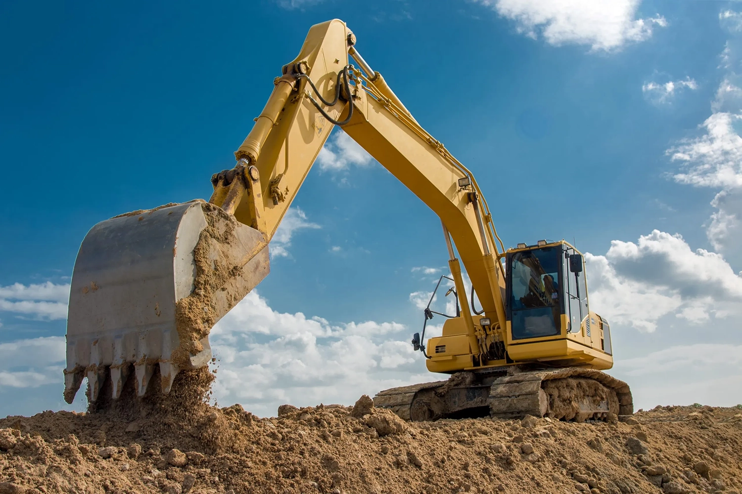 Excavator digging on a Brisbane civil construction site
